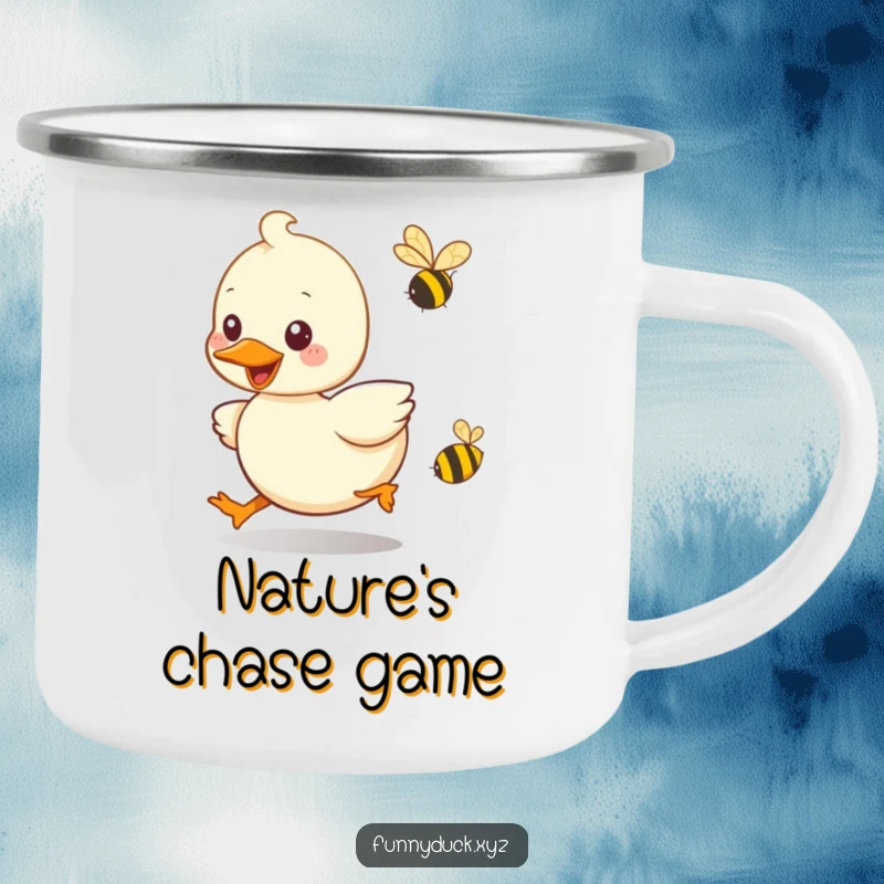 Funny Kawaii Duck Camping Mug showing a duck playfully chasing a bee, ideal for humorous outdoor enjoyment.